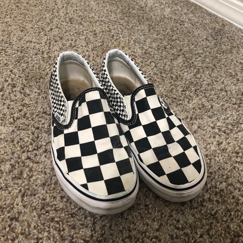 Checkerboard slip-on vans